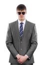 Bodyguard wearing a suit and sunglasse