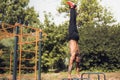 Bodyweight Exercise. Man Standing On Hands And Doing Push Ups