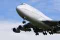 Boeing 747 flying low overhead.
