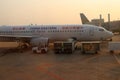 Boeing 737-800 aircraft, the plane of China Eastern loading luggage on the Apron at Phnom Penh International Airport Royalty Free Stock Photo