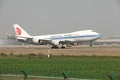 A boeing 747 cargo landing on the runway