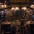 Boeing 737 classic Cockpit during night time operation. All panels illuminated. Royalty Free Stock Photo