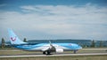 Boeing 737 of the company TUIfly rolling on the runway before take off