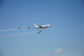 Boeing 737 flanked by four airplanes