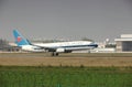 A boeing 737 landing on the runway