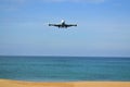 Boeing 777 landing on the tropical island of