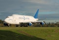 Boeing 747 LCF Large heavy cargo freighter in golden light