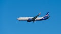 Boeing 737-8LJWL Boeing 737-8LJWL descends for landing at Adler airport runway against blue spring sky. Boeing 737-800