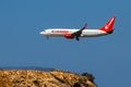 A Boeing 737-800 of the low-cost airline Corendon Airlines with the identification number 9H-TJB approaching for landing