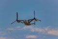 Boeing MV-22B Osprey flying in the air against the blue sky during the daytime