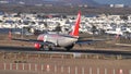 Boeing 737-800 NG of Jet2 airline landing rollout and taxiing on airport runway