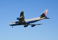 The Boeing-747 plane of Transaero airline decreases before landing at the Sheremetyevo airport Royalty Free Stock Photo