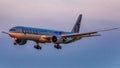 Boeing 777-300 Qatar Airlines on sunset