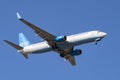 Boeing 737-800 (RA-73244) of Pobeda airline on glide path in blue cloudless sky