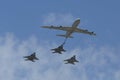 Boeing 707 refueling tanker in formation with F-15I all-weather multi role strike fighter during Israel`s Annual Independence Day
