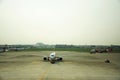 Boeing and thai people prepare plane for take off and landing on runway at Don Mueang international airport on October 2, 2019 in Royalty Free Stock Photo