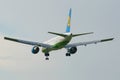 The Boeing 757 (UK-75701) Uzbekistan Airways plane coming in the land. Rear view Royalty Free Stock Photo