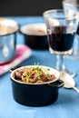 Boeuf bourguignon classic french beef stew on blue table with a Royalty Free Stock Photo