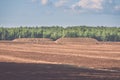 bog and the field on which the production is carried out in black peat mining - vintage film look