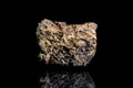 Bog iron ore, raw rock on black background, mining and geology