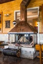 Beautiful stylish brass fireplace in the Koliba Bogetici restaurant