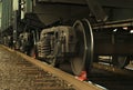 A bogie of freight railcar closeup, with brake shoe