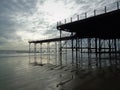 Bognor Regis Pier and reflections on the sand Royalty Free Stock Photo