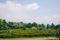 Bogor, Indonesia - A view of the flower themed park Taman Bunga Nusantara in a cloudy afternoon with a view to a labyrinth field