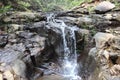 water channel in the middle of rocks in the morning