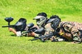 Bogor, West Java, Indonesia, May 2nd 2022. A group of people playing paintball lying on the ground