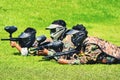 Bogor, West Java, Indonesia, May 2nd 2022. A group of people playing paintball lying on the ground