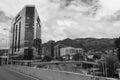 Bogota black and white photography scene with modern buildings and mountans at background