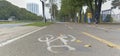 Bicycle symbol over asphalt of bike path at 170th avenue at north of the city