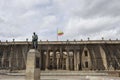 BOGOTA, COLOMBIA Bolivar monument and nariÃÂ±o`s house with midpole colombian flag at bolivar square Royalty Free Stock Photo