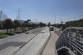 An empty Transmilenio station with empty north highway on sunny midday during bogota no car day