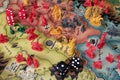 Close up to a Lord of the rings risk game board with game pieces and dice