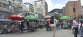 famous San victorino downtown neighborhood viewed from transmilenio station with street art and street stal