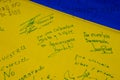 Bogota, Colombia - 18 October 2023. Messages written on the Colombian flag at the peaceful protest in Bogota of the members of the