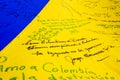 Bogota, Colombia - 18 October 2023. Messages written on the Colombian flag at the peaceful protest in Bogota of the members of the Royalty Free Stock Photo