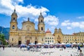 BOGOTA, COLOMBIA OCTOBER 22, 2017: Unidentified people walking in Bolivar square church in a beautiful blue sky in Royalty Free Stock Photo