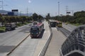 A Transmilenio Bus near to station in north highway in sunny day during bogota no car day