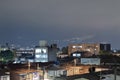 Bogota north industrial neighborhood night city lighs with la calera town light at background Royalty Free Stock Photo