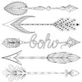 Bohemian Arrows set with feathers. Hand drawn decorative Arrows