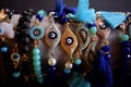 Close up of bohemian bracelets.Eye evil and tassels.