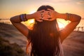 Bohemian chic gypsy happy free asian woman with manicure wearing hands jewelry accessories and white dress. Royalty Free Stock Photo