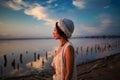 Bohemian chic gypsy happy free asian woman with manicure wearing hands jewelry accessories and white dress. Royalty Free Stock Photo