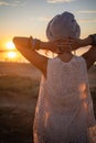 Bohemian chic gypsy happy free asian woman with manicure wearing hands jewelry accessories and white dress. Royalty Free Stock Photo