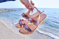 Bohemian greek sandals on the beach Royalty Free Stock Photo