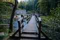 Bohemian Switzerland National Park, Czech Republic, 2 October 2021: old wooden bridge over river Kamenice near old stone water