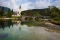 Bohinj lake with church in Slovenia Royalty Free Stock Photo